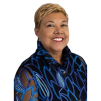 Woman smiling with black and blue shirt